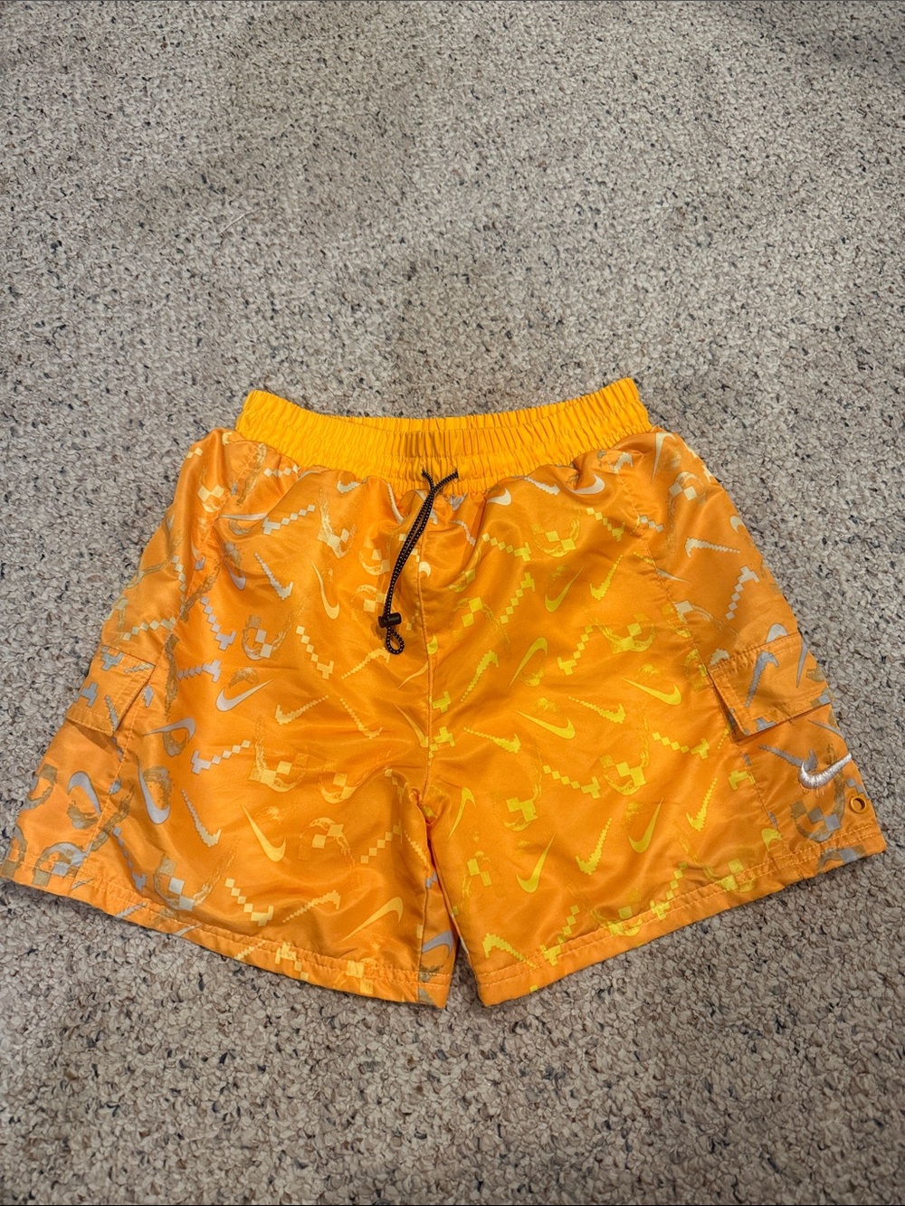 Nike Orange Kids' Swim Trunks with Graphic Swoosh Print